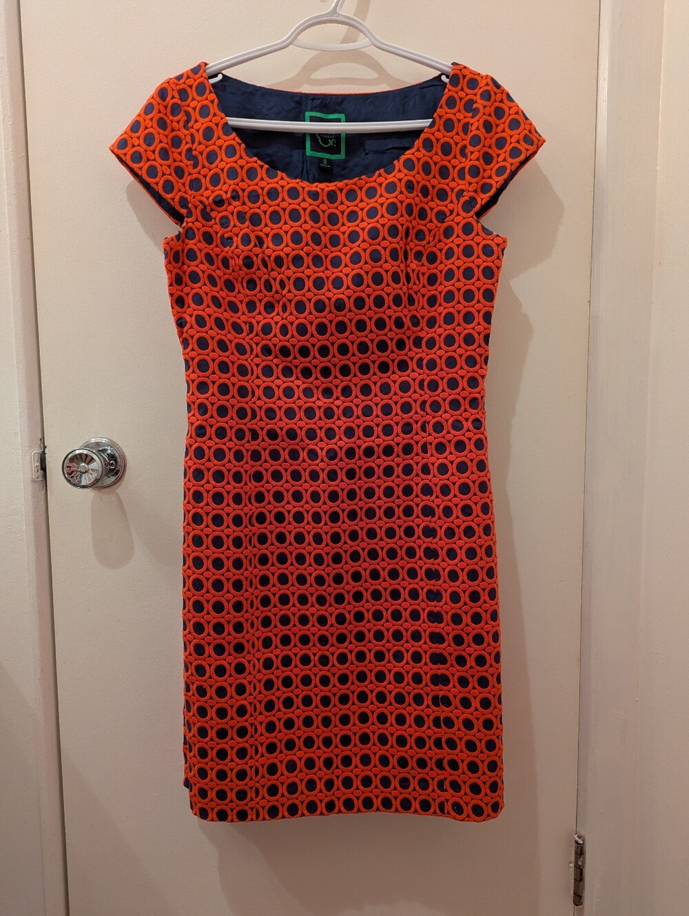 C. Wonder Orange Circle Dress with Navy Underlay